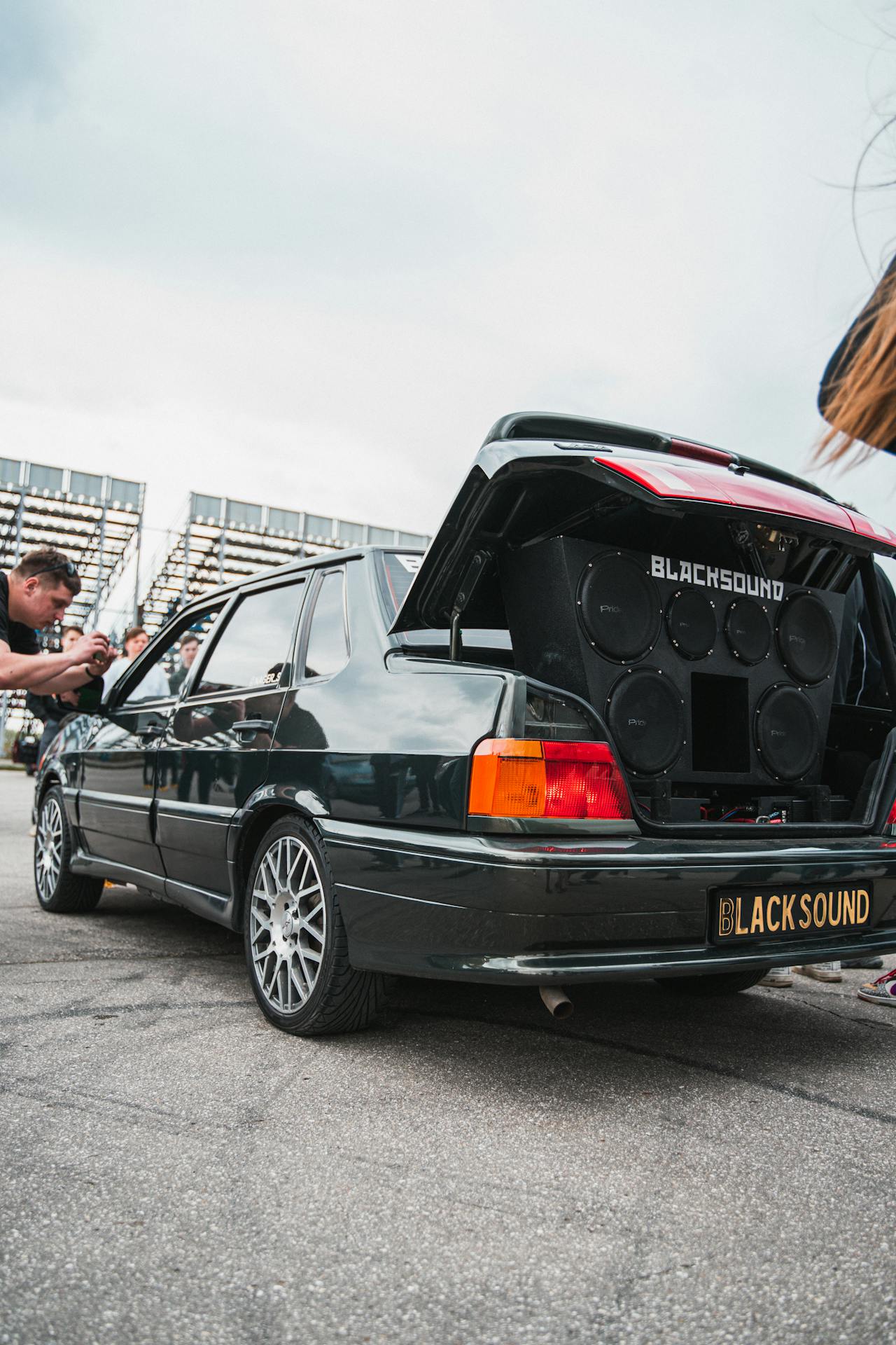 six subwoofers in back of a car